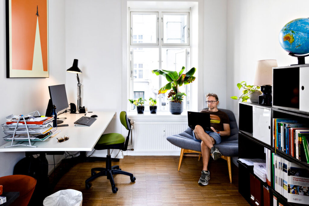 Photo of a single person in a small office